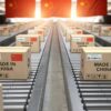 Boxes labeled Made in China on conveyor belt