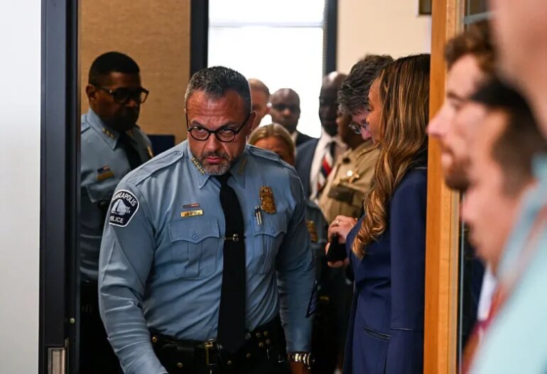 MINNEAPOLIS, MINNESOTA - AUGUST 28: Minneapolis Police Chief Brian O'Hara (C) arrives at a law enforcement briefing following a mass shooting at Annunciation Catholic School on August 28, 2025 in Minneapolis, Minnesota. According to Minneapolis Police, a gunman fired through the windows of the Annunciation Church at worshippers sitting in pews during a Catholic school Mass, killing two children and injuring at least 17 others. The gunman reportedly died at the scene from a self-inflicted gunshot wound. (Photo by Stephen Maturen/Getty Images)