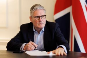 Keir Starmer making a phone call.