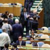 British Foreign Secretary David Lammy embracing Palestinian Prime Minister Mohammad Mustafa at a UN conference.