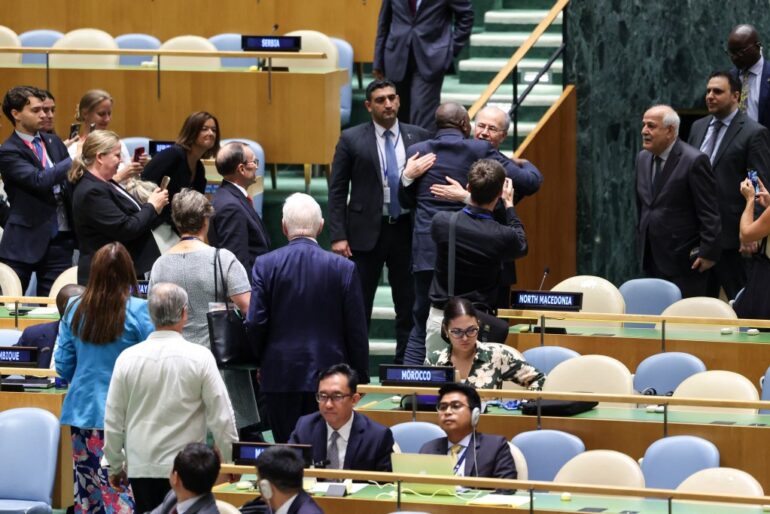 British Foreign Secretary David Lammy embracing Palestinian Prime Minister Mohammad Mustafa at a UN conference.
