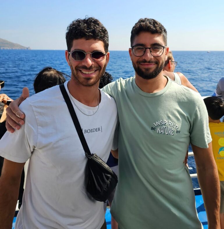 Israeli hostage Evyatar David (right) and brother Ilay, (left