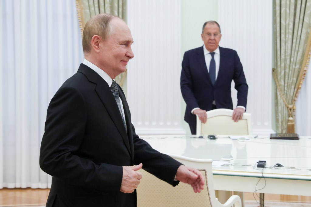 Vladimir Putin and Sergei Lavrov meeting with India's Minister of External Affairs.