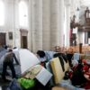 Afghan asylum seekers inside a Brussels church.
