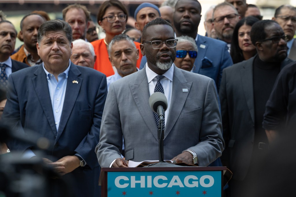 Chicago Mayor Brandon Johnson speaking at a press conference about President Trump's plan to deploy National Guard troops.