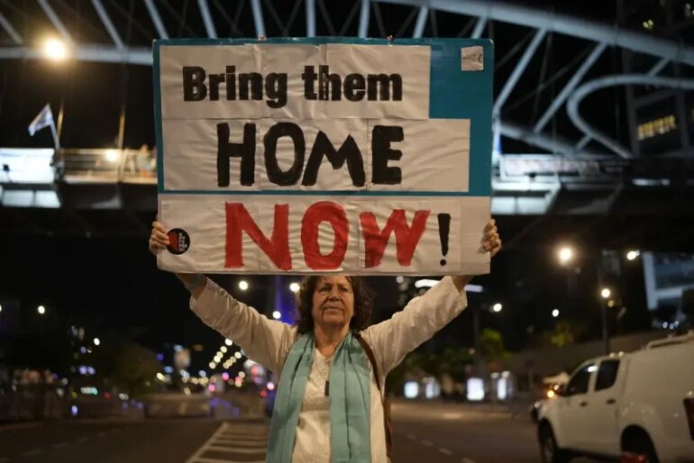 TEL AVIV, ISRAEL - NOVEMBER 21: People demonstrate prior any hostage announcements outside the Kirya defense complex as the political cabinet hold a meeting on November 21, 2023 in Tel Aviv, Israel. Families and supporters of hostages held by Hamas in Gaza gathered near The Kirya defense complex this evening as the Israeli cabinet convened regarding a proposed deal with Hamas for the release of some hostages. The full terms of such a deal were not clear, but both the Israeli prime minister and Hamas leader reported progress. (Photo by Christopher Furlong/Getty Images)