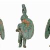 The Celtic warrior statuette after restoration, depicting a warrior in lunging pose with sword and shield