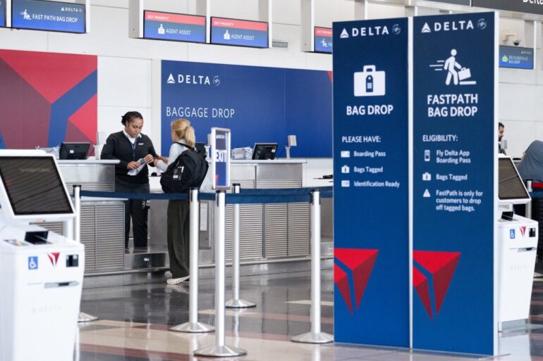Delta Air Lines baggage drop-off counter.
