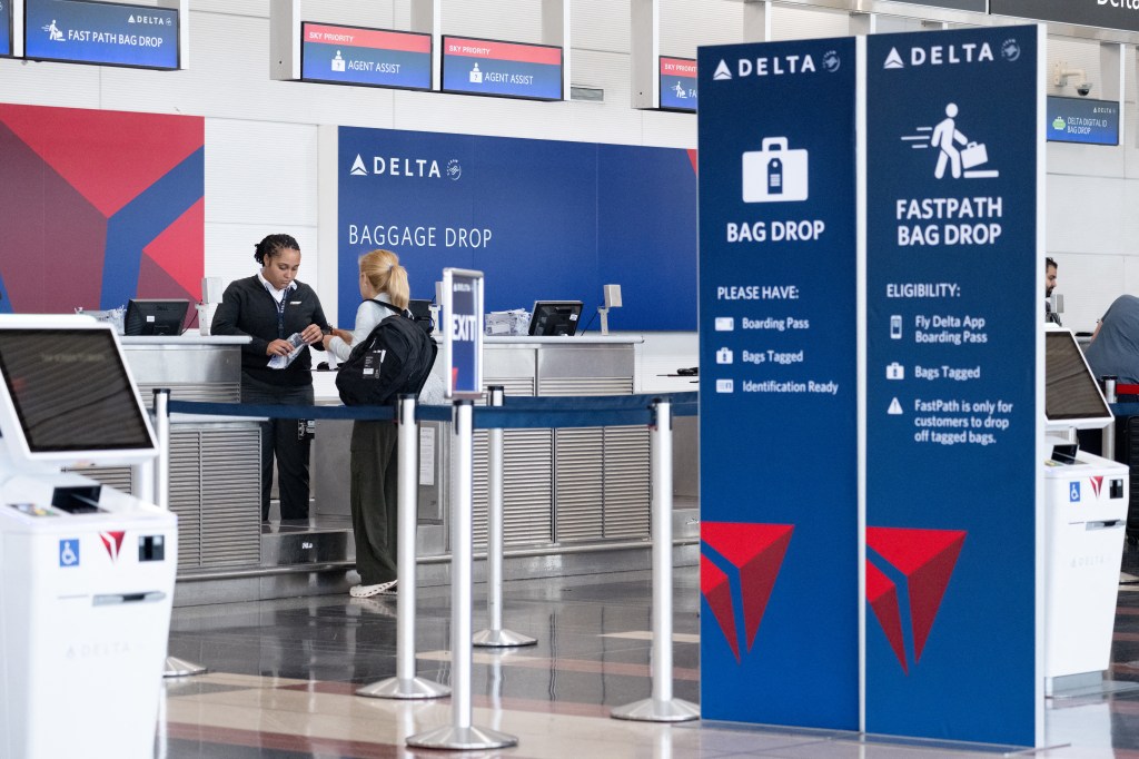 Delta Air Lines baggage drop-off counter.