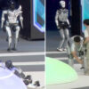 Science & tech: humanoid machine face plants at china's inaugural 'robot