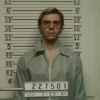 Jeffrey Dahmer stands for his mugshot photo