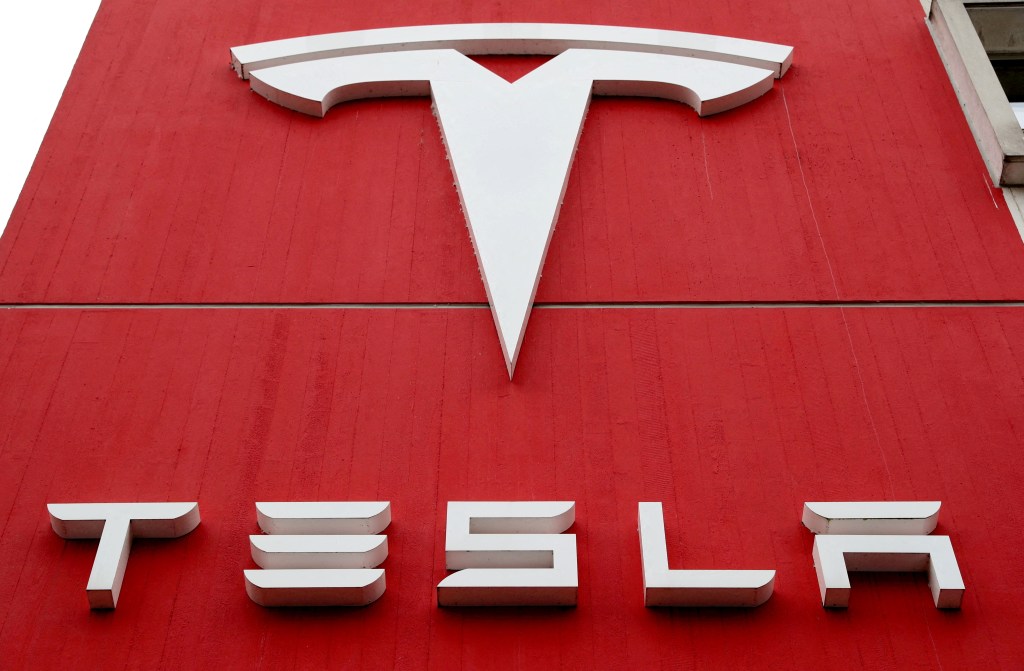 Tesla logo on a red building.