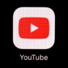 YouTube logo on a black background.