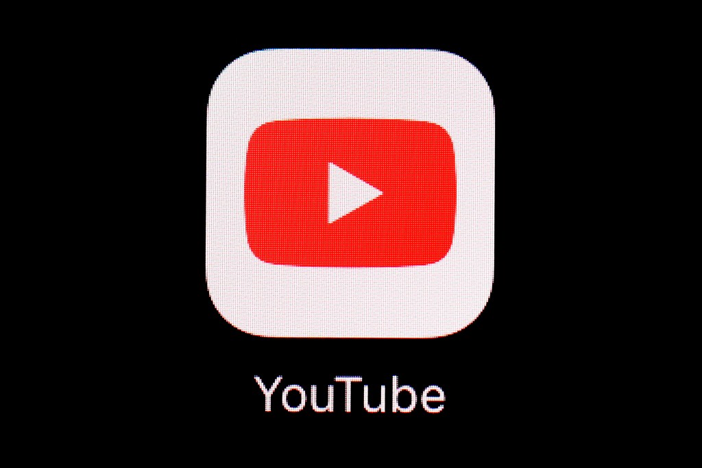 YouTube logo on a black background.