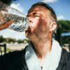 Pacing your water intake can be easier on your stomach, experts say.