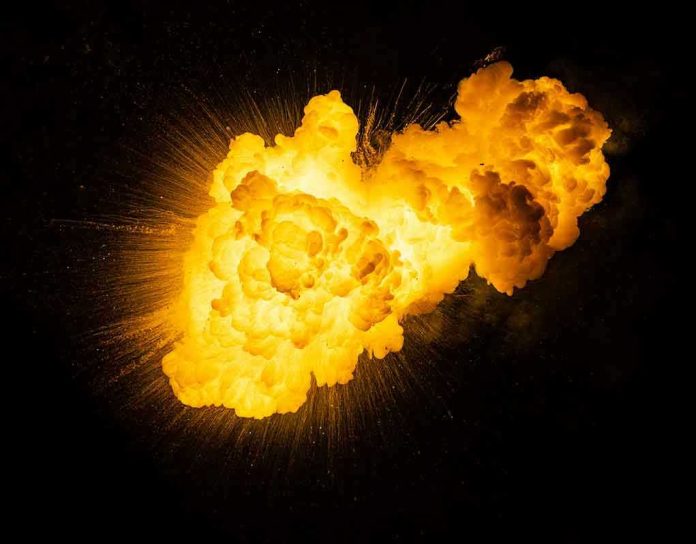 Bright vfiery explosion against a dark background