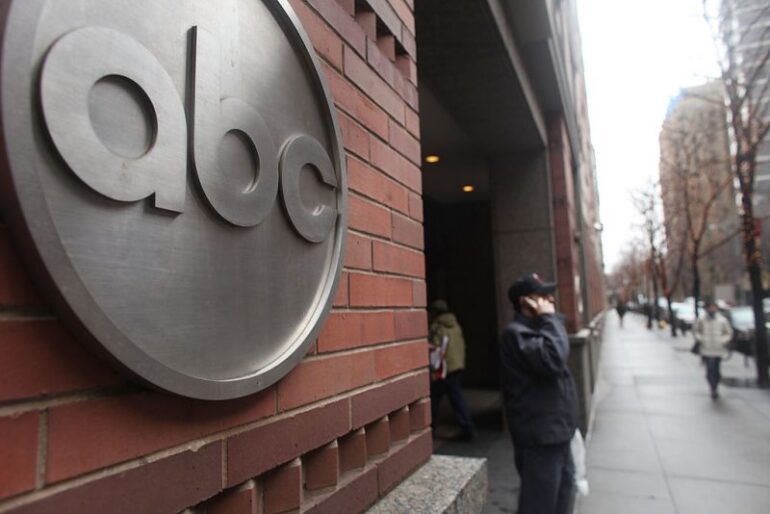 NEW YORK - FEBRUARY 24: People stand outside of the ABC headquarters on February 24, 2010 in New York, New York. ABC has announced that the television news division plans to cut 20-25 percent of its workforce, or between 300-400 people, through buyouts or layoffs. The news division plans to use more contractors and freelancers to make up for the loss of fulltime employees. (Photo by Spencer Platt/Getty Images)