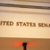 Sign displaying United States Senate in a government building