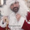 Zohran Mamdani dressed as "Climate Santa" in a red and white Santa suit with a gold bag, with text overlay.