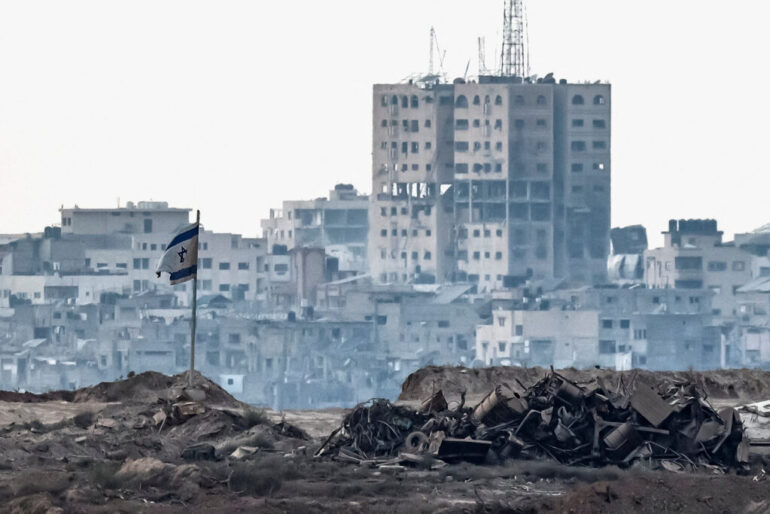Politics: israel bombs another gaza city high rise as palestinians flee