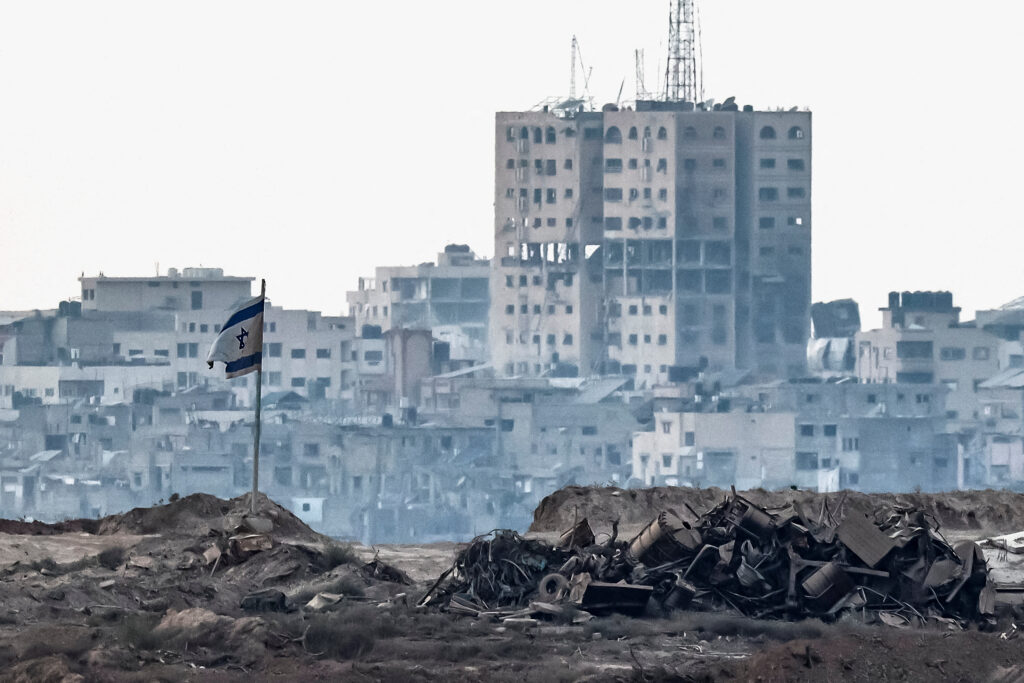 Politics: israel bombs another gaza city high rise as palestinians flee
