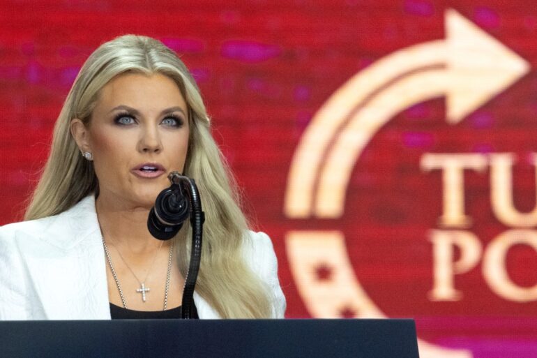 Erika Kirk speaking at the Charlie Kirk Memorial.
