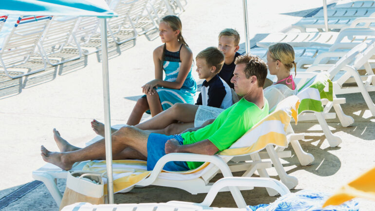 Satire news: family views getting sunburned as moral failing