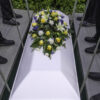 Satire news: mourners unaware they burying knockoff giorgio armani