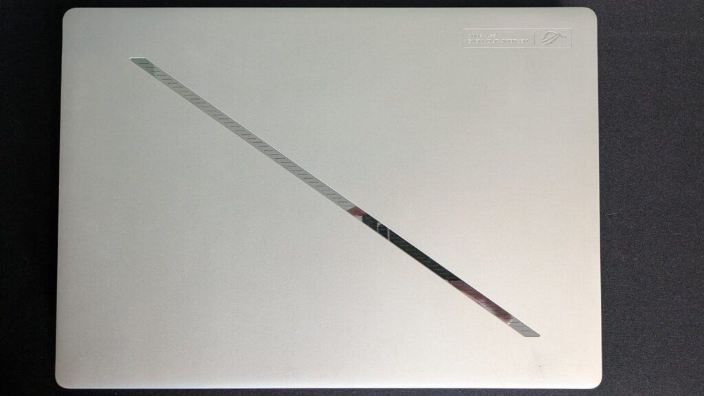 Bird's eye view of closed lid on Asus ROG Zephyrus G14 (2025) on a black background