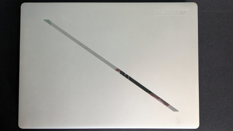 Bird's eye view of closed lid on Asus ROG Zephyrus G14 (2025) on a black background