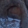 Drone footage showing the massive stone doorway formation in Kazakhstan's Dzungarian Alatau mountains