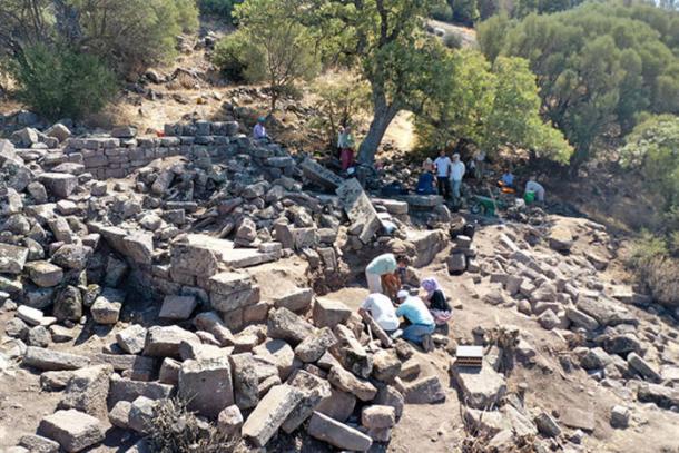Aerial view of the Hellenistic temple excavation site at Aigai showing the two-room sanctuary structure.