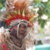 A Papua New Guinean wearing traditional wear.