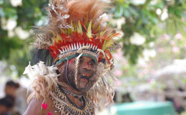 A Papua New Guinean wearing traditional wear.