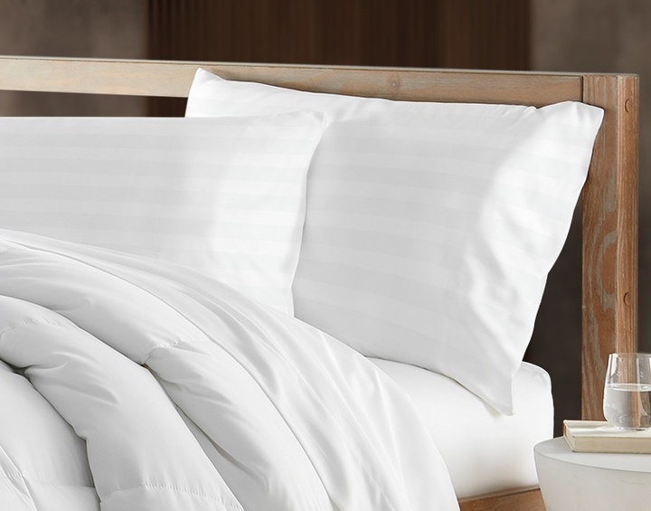 These highly-rated Beckham Collection bed pillows are only $47.99 today when you click the on-page 20% off coupon.