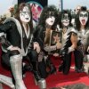HOLLYWOOD, : Members of the rock band Kiss (from left to right): Ace Frehley, Paul Stanley, Peter Criss and Gene Simmons pose by the star they received during a Hollywood Walk of Fame ceremony 11 August 1999 in Hollywood, Ca. The group, known for their theatrical stage performances, has sold 80 million records over their 26 year career. AFP PHOTO/Vince BUCCI (Photo credit should read Vince Bucci/AFP via Getty Images)