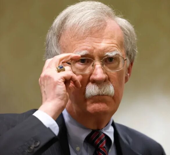 WASHINGTON, DC - AUGUST 17: Former National Security Adviser John Bolton speaks to reporters after speaking in a panel hosted by the National Council of Resistance of Iran – U.S. Representative Office (NCRI-US) at the Willard InterContinental Hotel on August 17, 2022 in Washington, DC. The NCRI-US held the panel to mark the 20th anniversary of their first press conference on the perceived threat of Iran’s nuclear weapons program. Recently the U.S. Justice Department announced charges against an Iranian operative for a plot to murder John Bolton. (Photo by Anna Moneymaker/Getty Images)