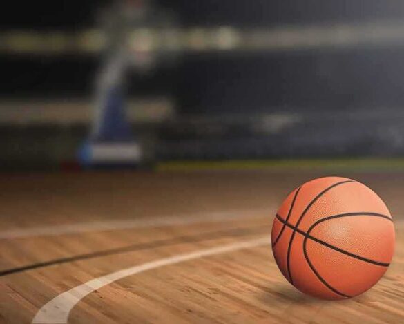 A basketball on a wooden court