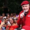NEW YORK, NEW YORK - AUGUST 27: Guardian Angels founder Curtis Sliwa speaks during an anti-migrant rally and protest outside of Gracie Mansion on August 27, 2023 in New York City. Guardian Angels founder Curtis Sliwa was joined by local officials and hundreds of protestors, as he held another anti-migrant protest after staging several in Brooklyn and Queen against the migrant relief shelters in the boroughs. NYPD made several arrests, including Sliwa and two supporters who were arrested for civil disobedience. According to the latest data from the city, there are more than 59,000 migrants in city shelters, with hundreds more arriving every week. (Photo by Michael M. Santiago/Getty Images)