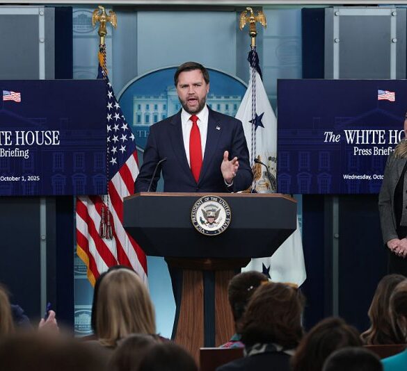 WASHINGTON, DC - OCTOBER 01: U.S. Vice President JD Vance speaks as White House Press Secretary Karoline Leavitt (R) looks on during the daily press briefing in the Brady Press Briefing Room at the White House on October 01, 2025 in Washington, DC. Vance joined Leavitt to discuss the federal government shutdown, after Congress and the White House failed to reach a funding deal by the October 1 deadline and halted U.S. government services for the first time in nearly seven years. (Photo by Alex Wong/Getty Images)