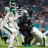 Politics: ex jets qb stabbed in pub fight, suspect says he