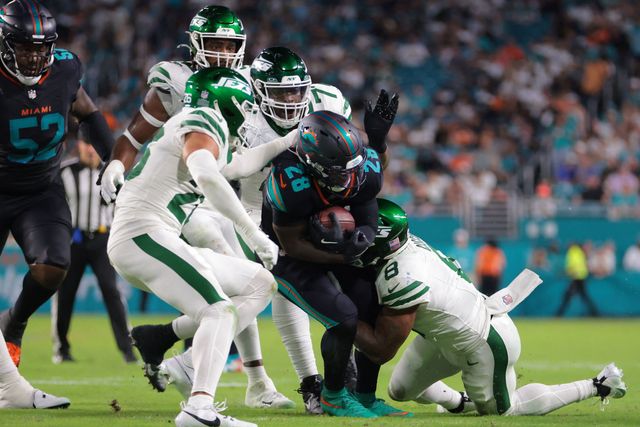 Politics: ex jets qb stabbed in pub fight, suspect says he