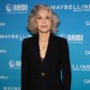 Jane Fonda stands in front of a blue backdrop with "NAMI" and "CAAfoundation" logos.