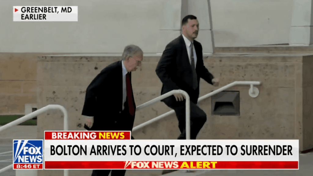 Politics: john bolton surrenders to authorities