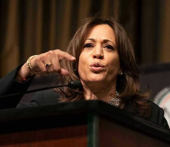 Person speaking passionately at a podium.