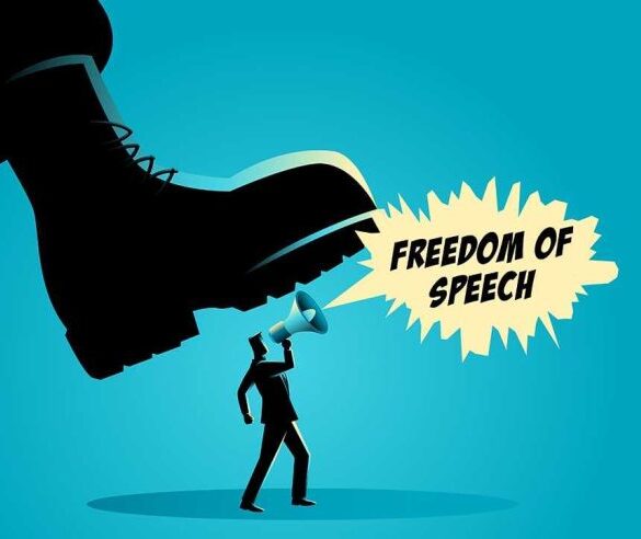A man holding a megaphone under a large boot, symbolizing censorship of free speech