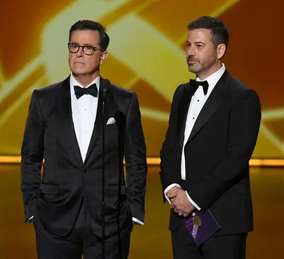LOS ANGELES, CALIFORNIA - SEPTEMBER 22: (L-R) Stephen Colbert and Jimmy Kimmel speak onstage during the 71st Emmy Awards at Microsoft Theater on September 22, 2019 in Los Angeles, California. (Photo by Kevin Winter/Getty Images)