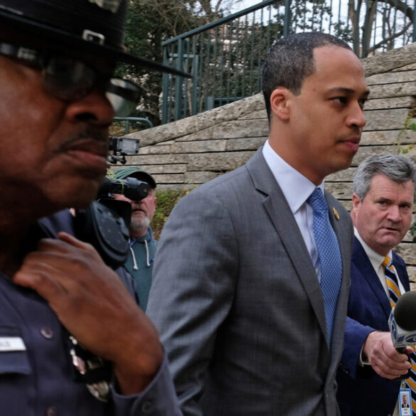 Politics: virginia police union urges democrat candidate for ag to