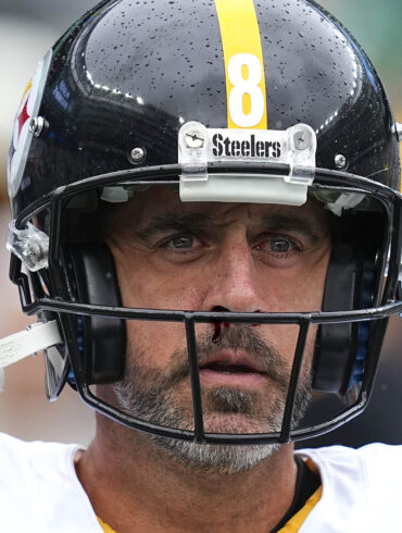 Satire news: aaron rodgers suffers torn cerebellum after attempting telepathic