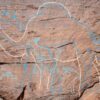 Images of camels highlighted on the rock art site found in Nefud Desert in Saudi Arabia.